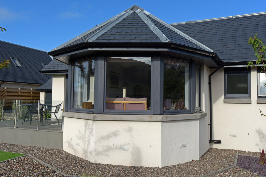 Specialist render and Roof
